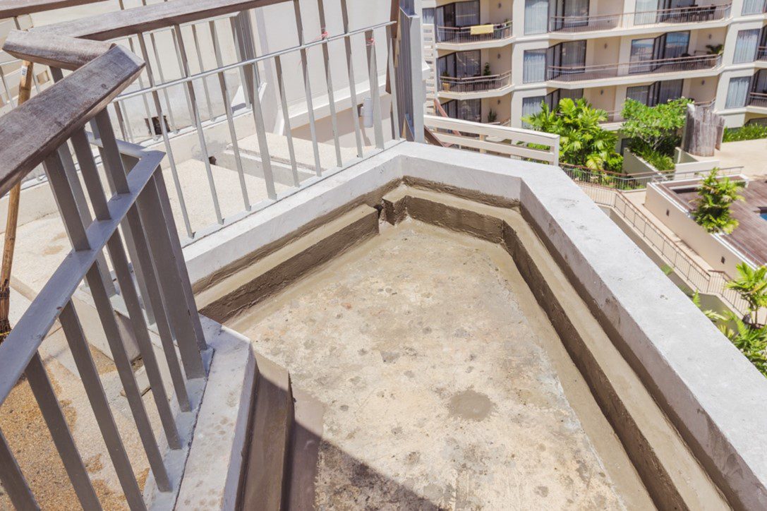 A concrete slab with a hole in it for the stairs.