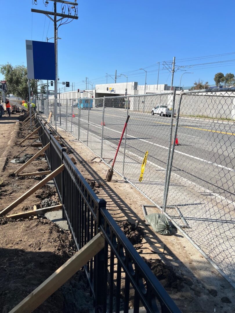 Construction fence with wooden supports.