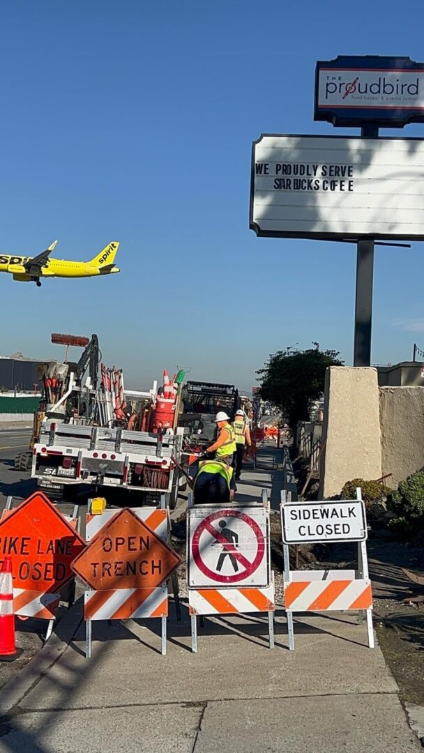 Road construction with warning signs.