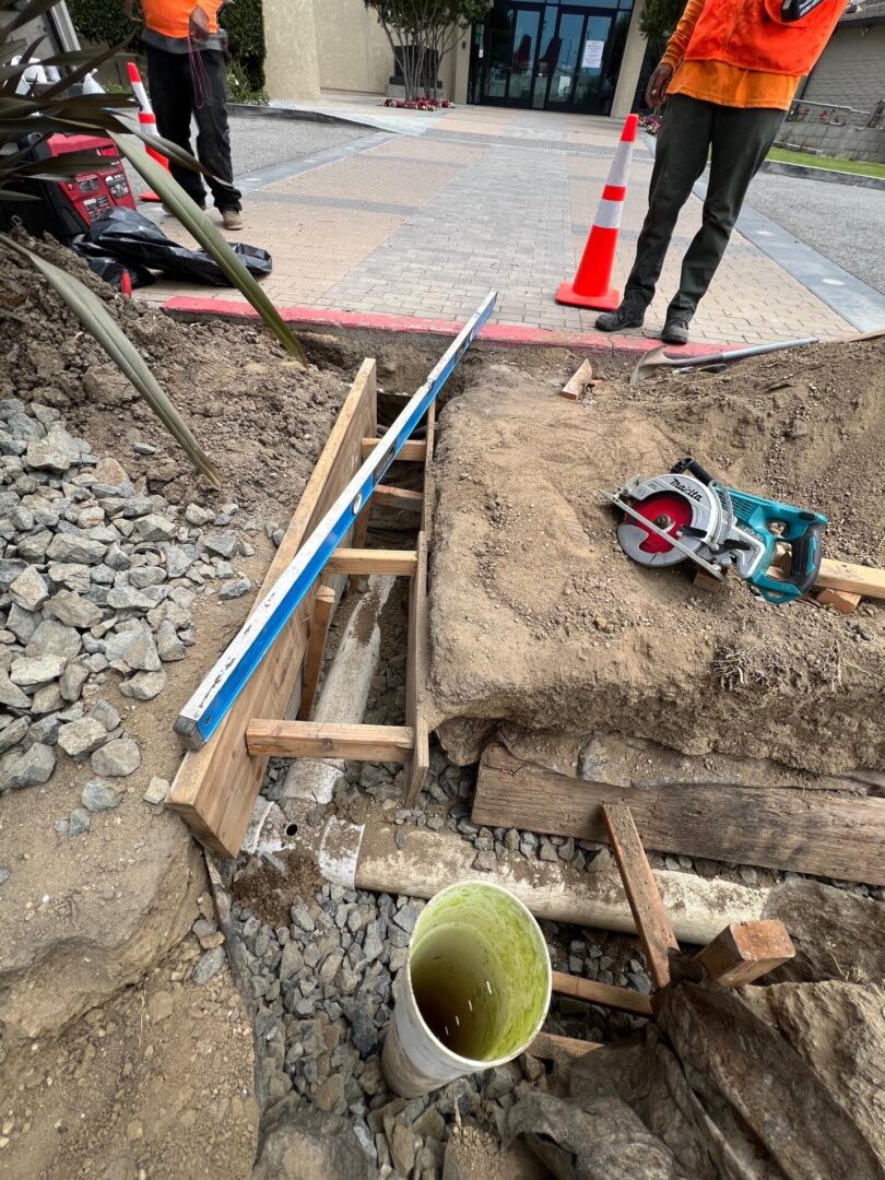 Construction site with pipe and level.