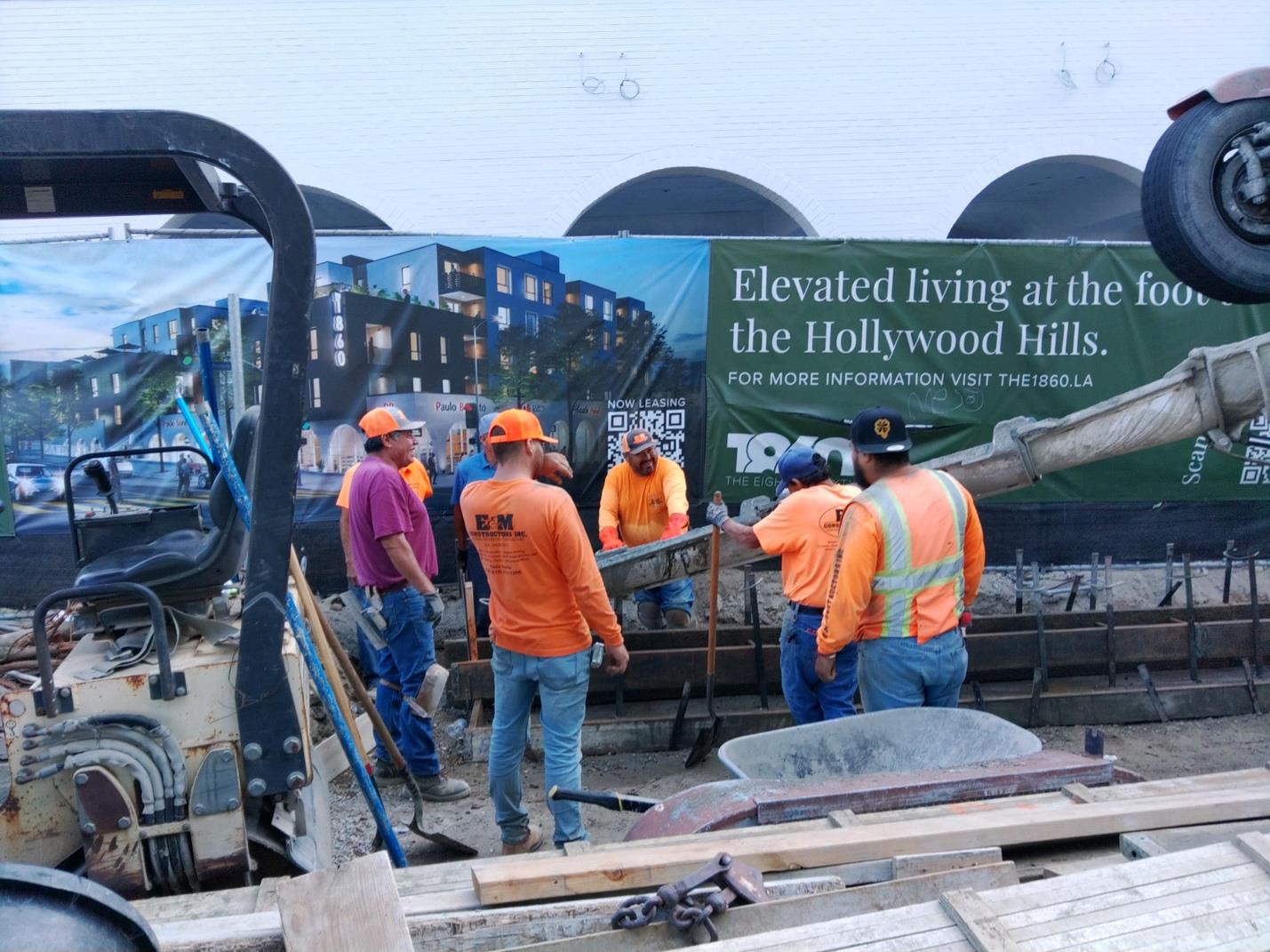 Construction workers pouring concrete in Hollywood Hills.